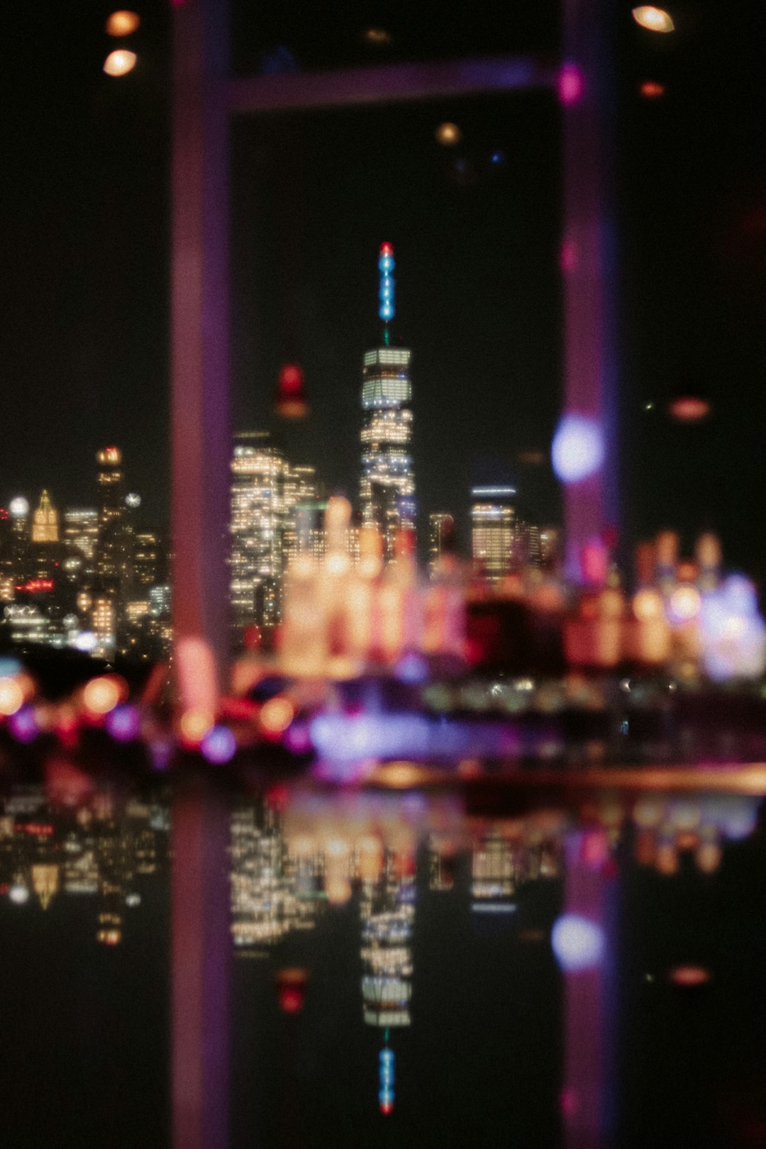 A view of a city at night from across the water